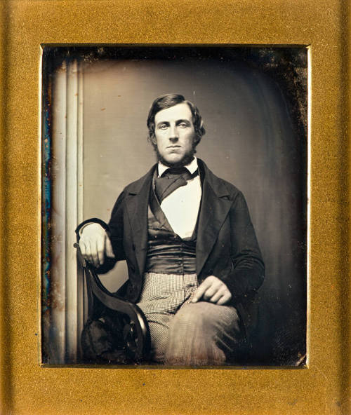Portrait of seated man