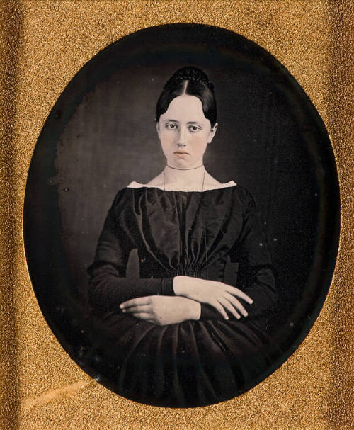 Woman with crossed arms