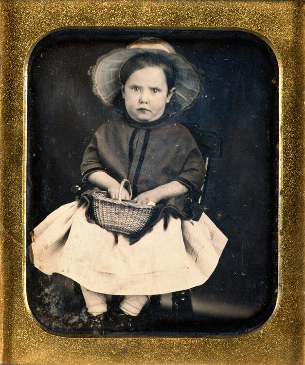 Portrait of girl with basket