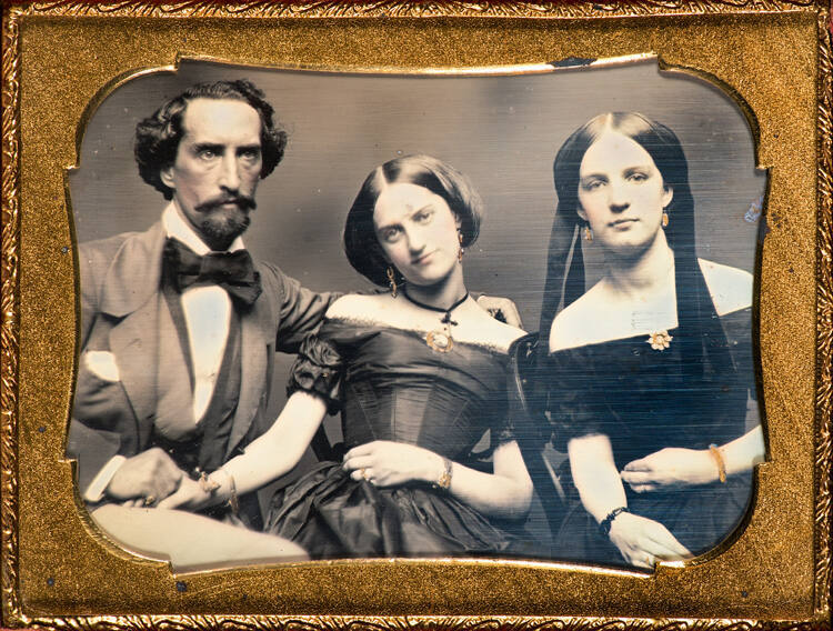 Group: Two women and a man
