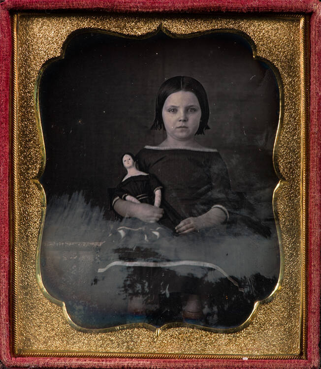 Girl with Doll
