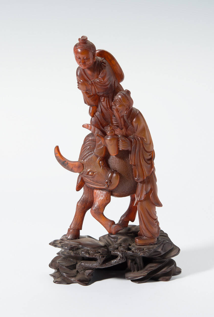 Old Man and Boy on Water Buffalo