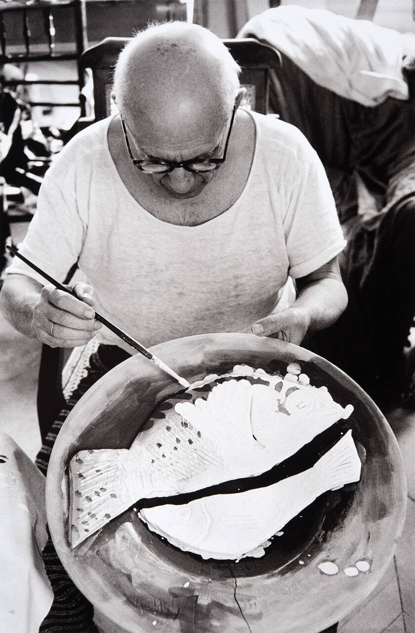 Picasso at work on another plate