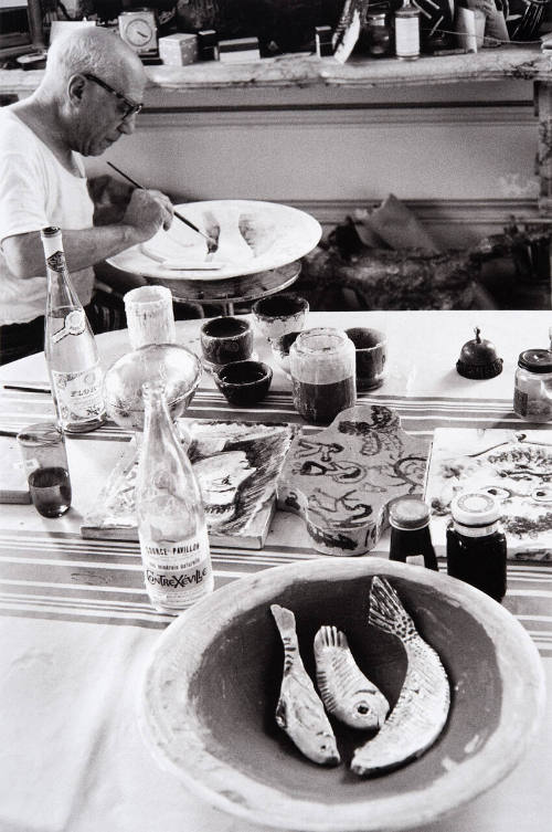Picasso at work on another plate