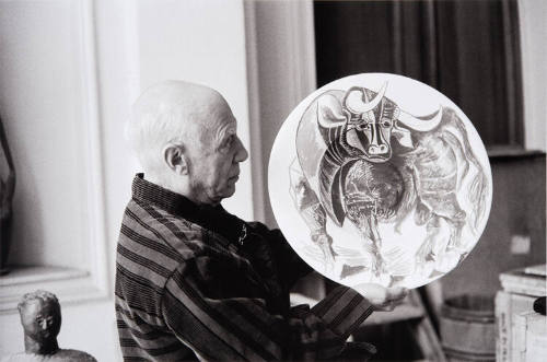 Picasso with painting of bullfight drama