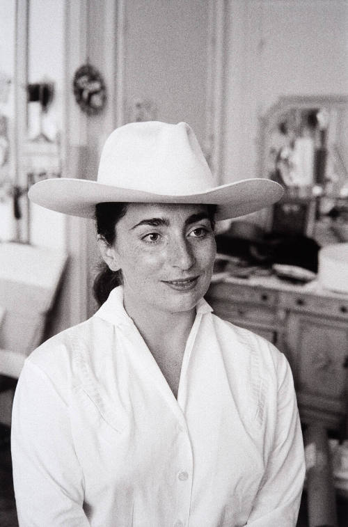 Jacqueline wearing a hat
