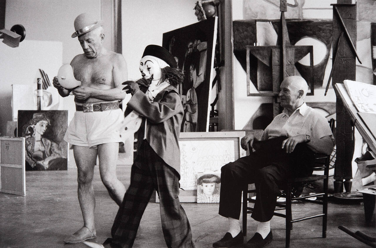 Kahnwiler, Picasso and Claude dressed as a clown