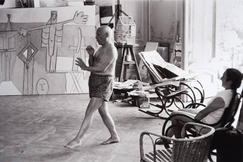 Picasso playing the reed pipes of an imaginary Pan