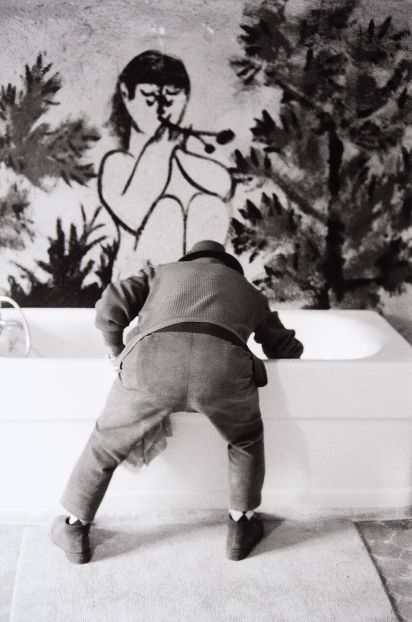 In the newly muraled bathroom at Château de Vauvenargues, Picasso chases a scorpion in the bath tub