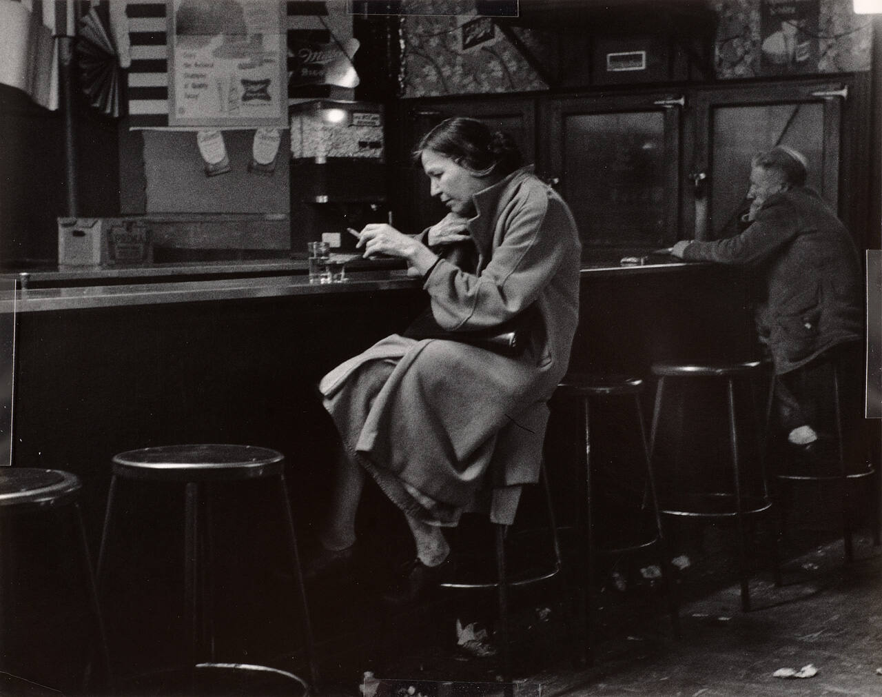 Untitled (woman alone at bar)