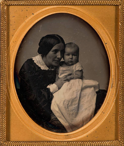 Mother Embracing Child