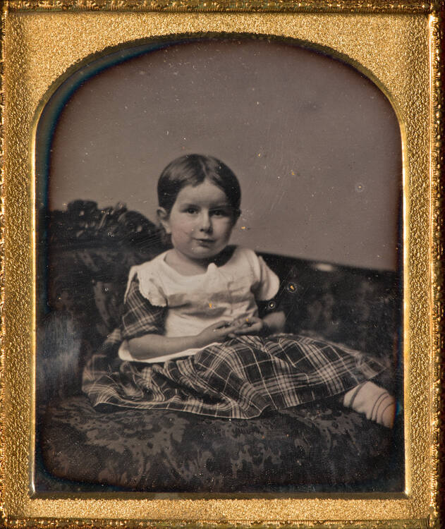 Portrait of artist's daughter on sofa