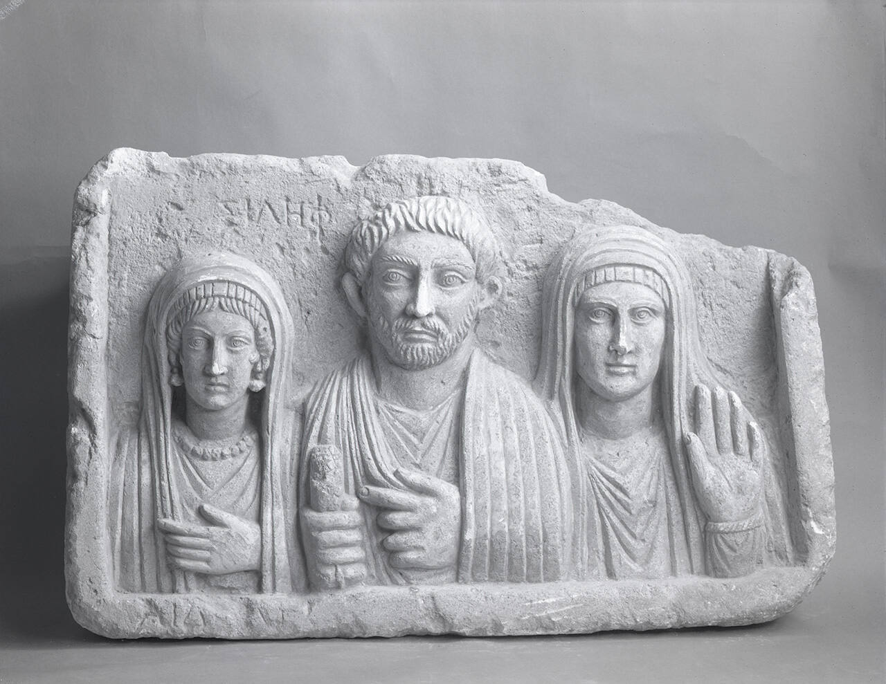 Relief with Three Figures