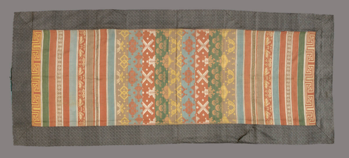 Fragment of a bedspread or chair cover