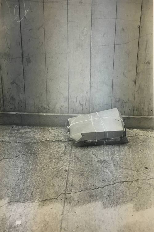 Wrapped box of trash