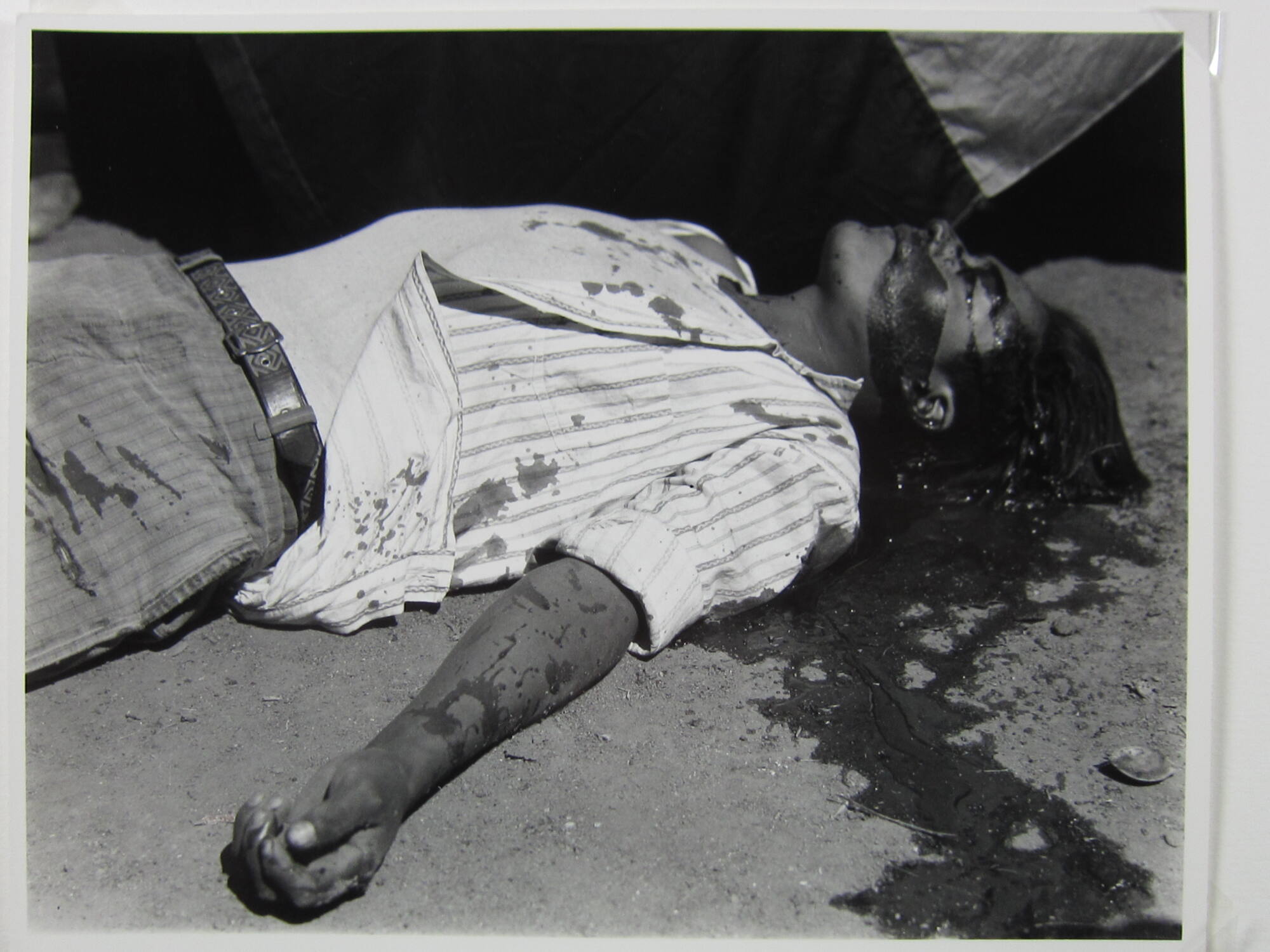 Striking worker, Assassinated