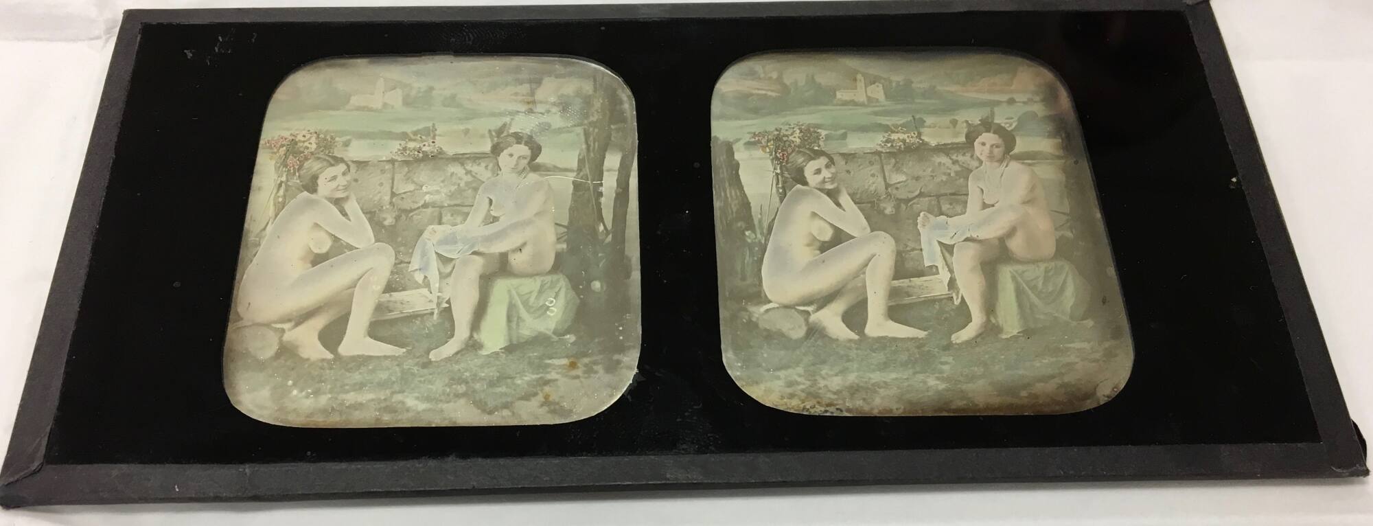 Two nude women bathing