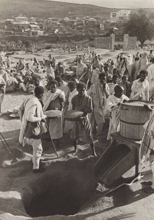 Citizens of Harar storing grain in underground bunkers before the outbreak of the Italian war against Ethiopia