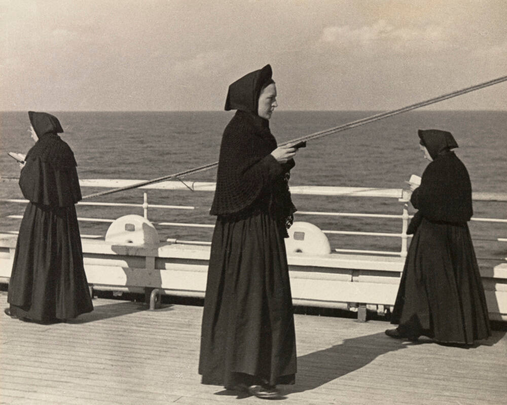 French nuns praying on deck of freighter in the Red Sea on the way from Marseille to Djibouti