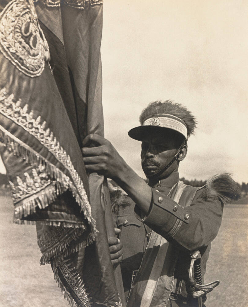 The Imperial flag of Emperor Haile Selassie carried by an officer of the Imperial bodyguard at the Palace ground
