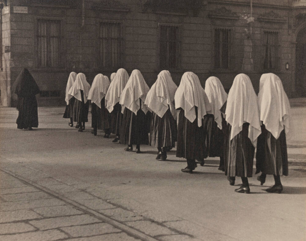 Young nuns on the way to Sunday Mass in Torino, Italy
