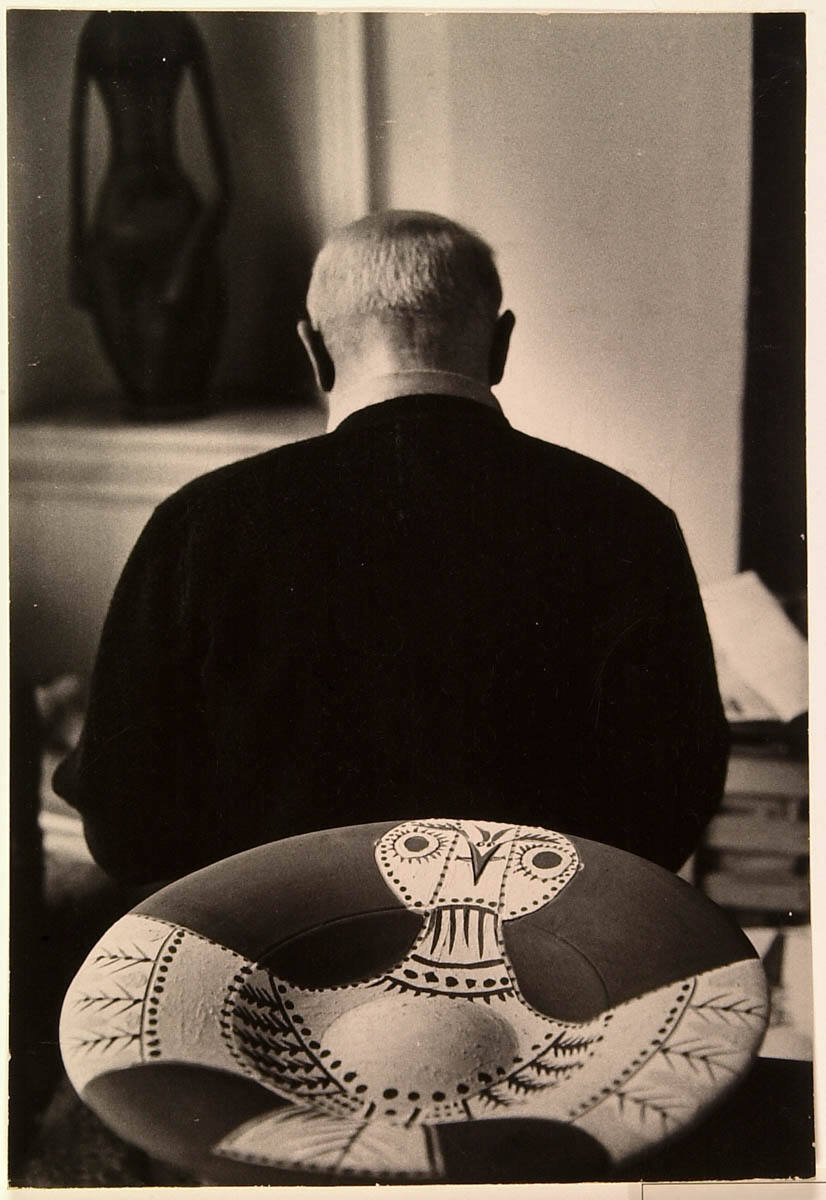 Picasso Starts to Paint Plates; Bronze Head of Dora Maar Above. Colors on Plates After Firing, and Examines Other Newly-painted Plates Before Firing